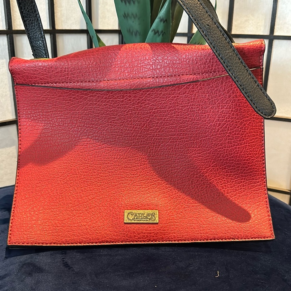 Carlos Santana red leather crossbody bag